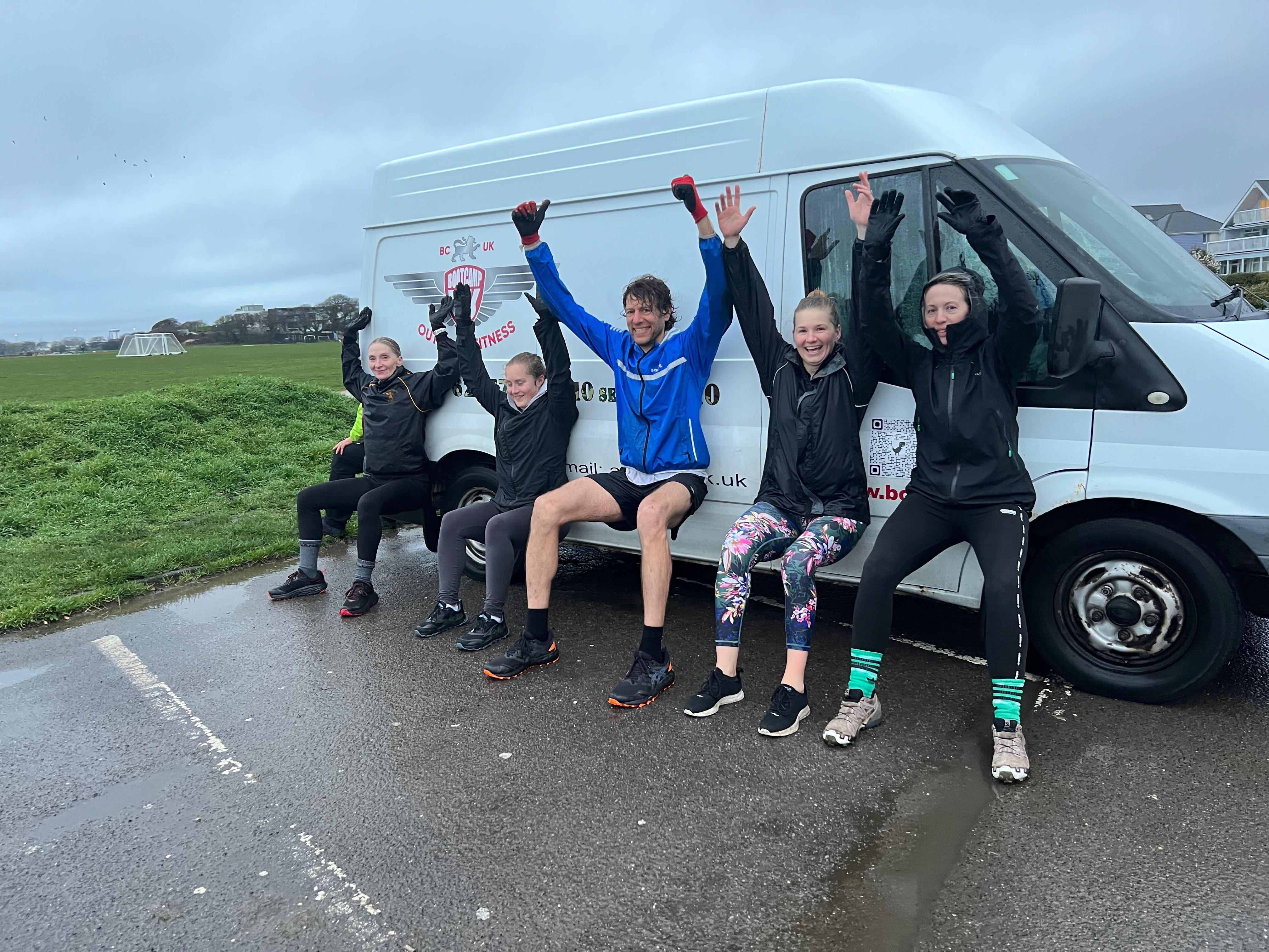 Bootcamp members celebrating after an outdoor session