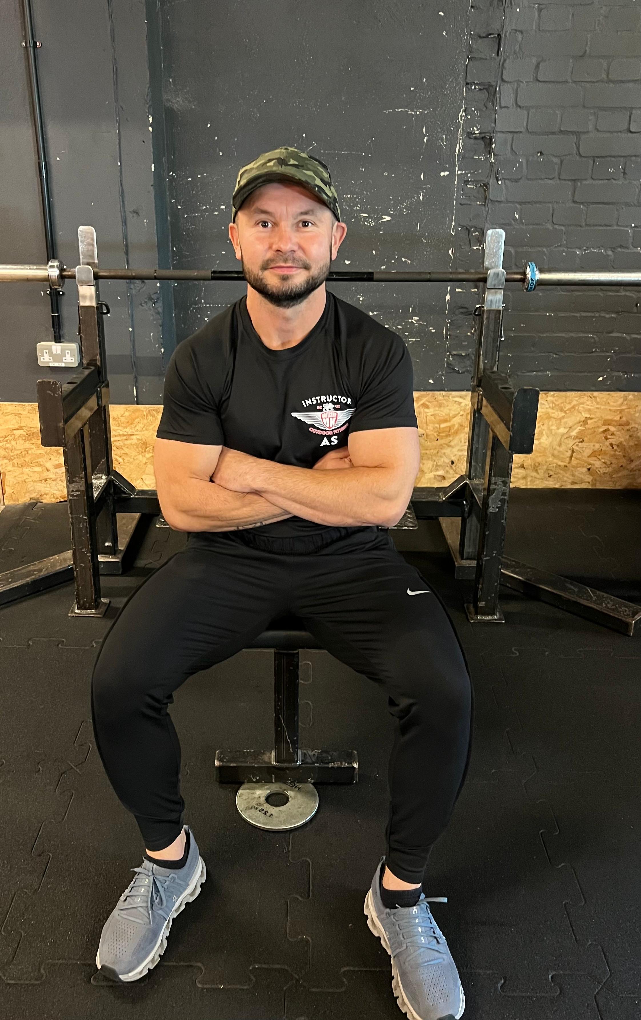 Alin Suciu seated in the gym
